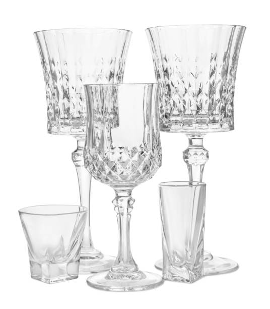 Different elegant empty glasses isolated on white